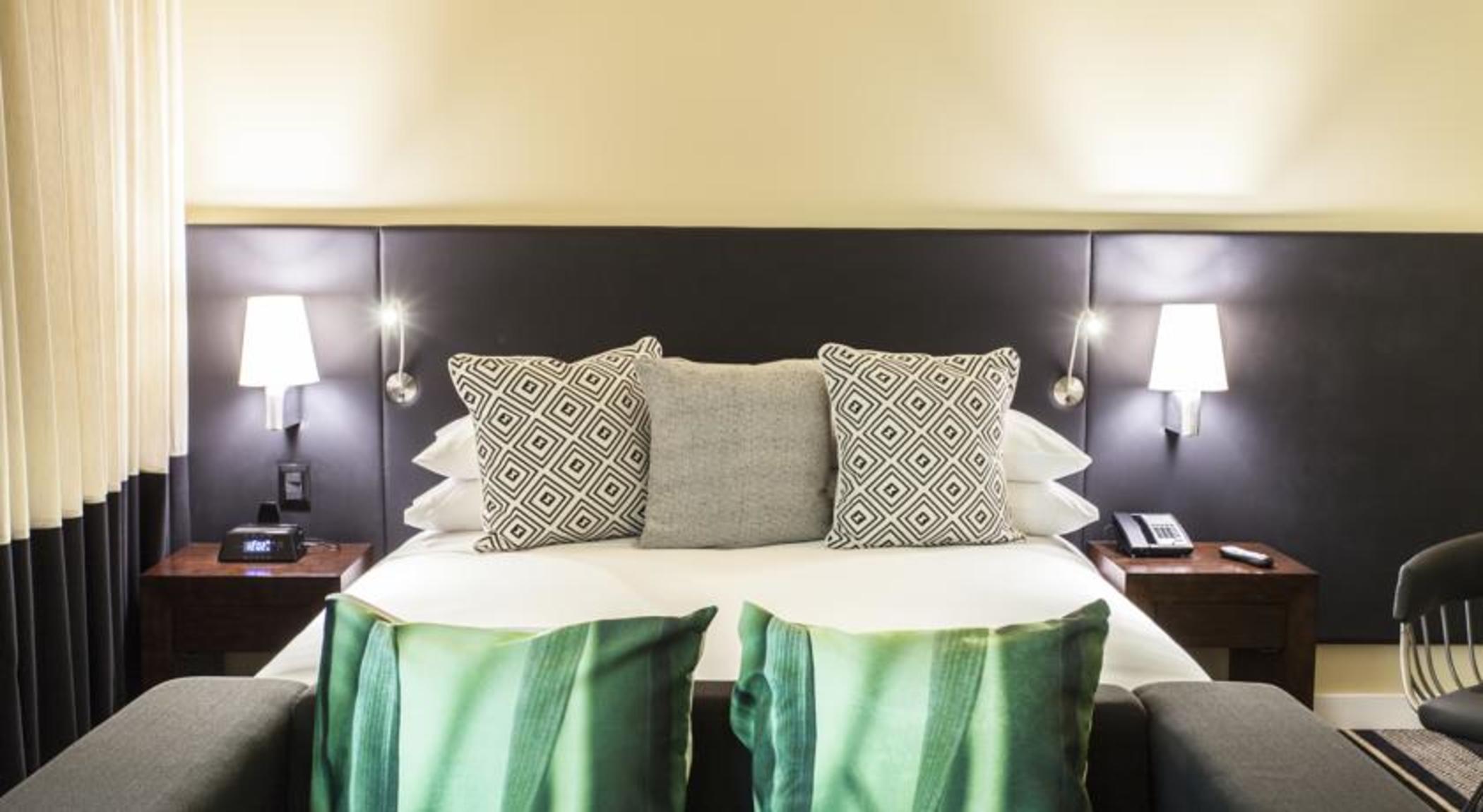 Hotel Movich Buro 26 Bogotá Exteriér fotografie A bed with a headboard
